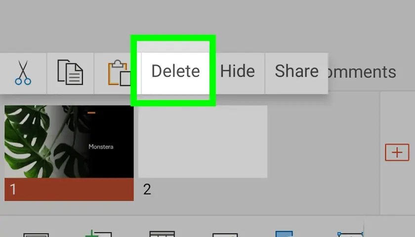 Przycisk "Delete" podświetlony na zielono na ekranie edycji prezentacji PowerPoint.