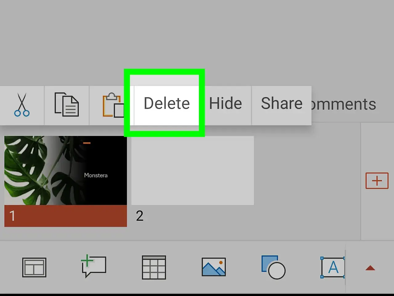 Przycisk "Delete" podświetlony na zielono na ekranie edycji prezentacji PowerPoint.